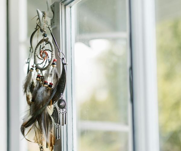 A calendar with a circle on one day and a yoga mat next to it.